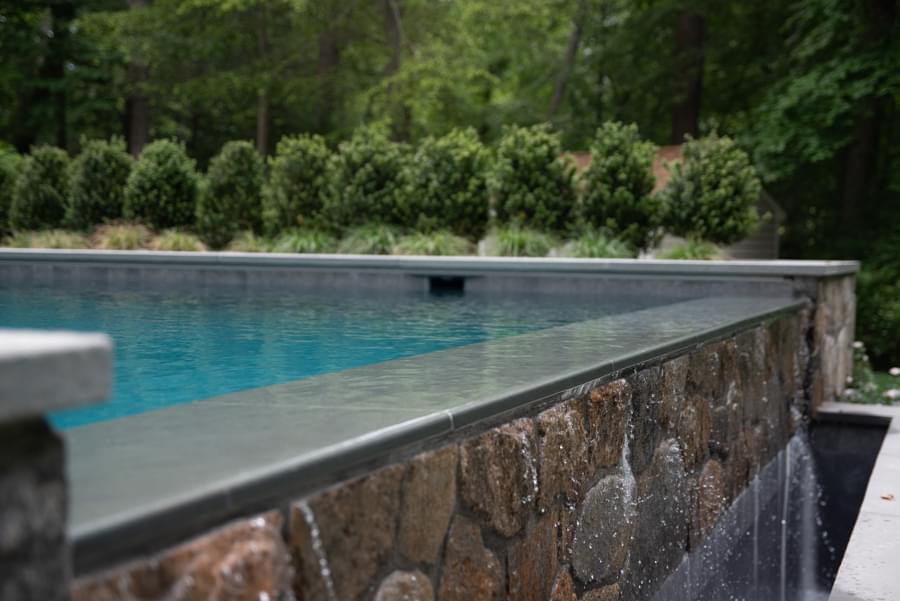 Custom outdoor living space with patio and landscaping